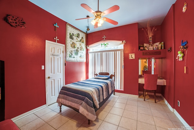 tiled bedroom with ceiling fan