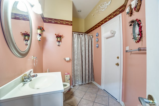 bathroom featuring toilet, tile patterned flooring, a shower with curtain, and vanity