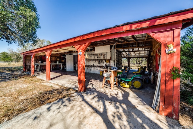 view of patio / terrace featuring an outbuilding