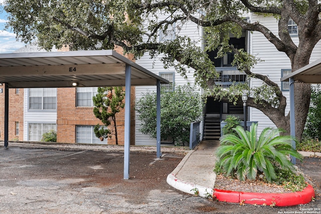 exterior space featuring a carport