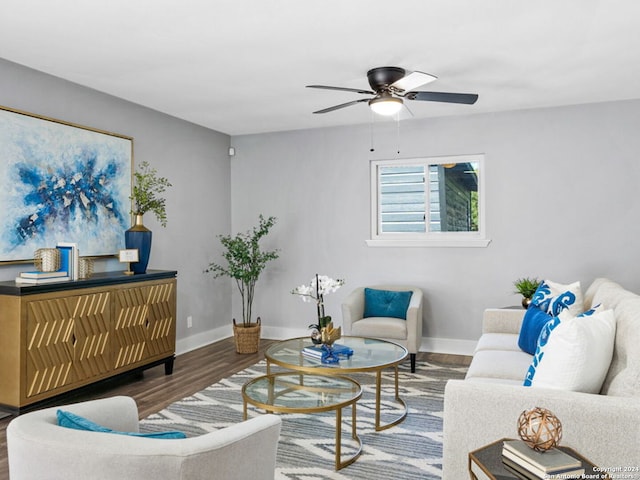 living room with hardwood / wood-style floors and ceiling fan