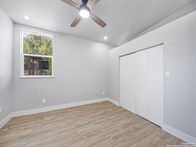 207 Ray Ave, San Antonio, TX 78204 - unfurnished bedroom with light wood-style flooring, a closet, a ceiling fan, and recessed lighting