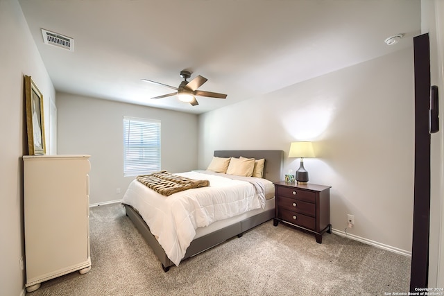 carpeted bedroom featuring ceiling fan