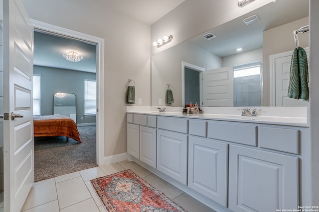 bathroom featuring vanity and tile patterned flooring