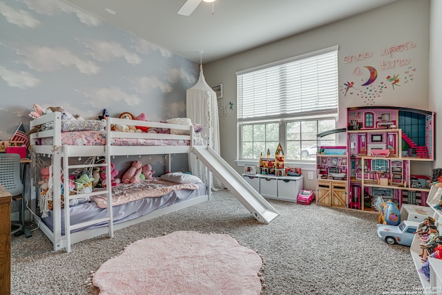 carpeted bedroom with ceiling fan