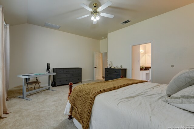 carpeted bedroom with ceiling fan, connected bathroom, and lofted ceiling