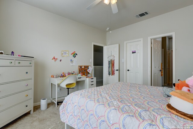 bedroom featuring ceiling fan and light colored carpet