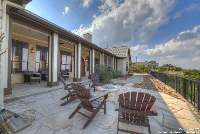 view of patio with an outdoor fire pit