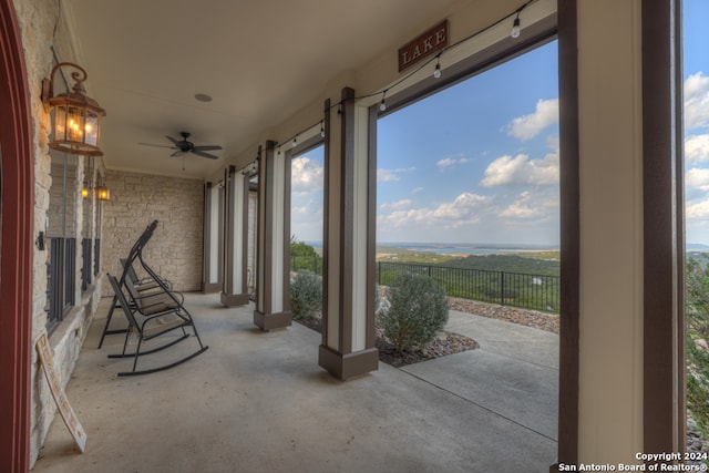 view of patio featuring ceiling fan