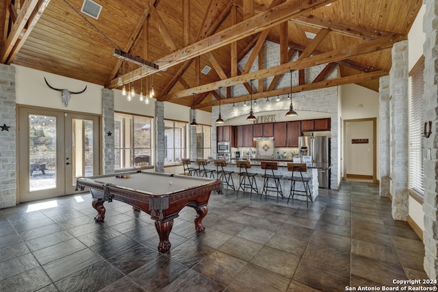 game room featuring french doors, beam ceiling, high vaulted ceiling, pool table, and wooden ceiling