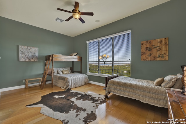 bedroom featuring ceiling fan and light wood-type flooring