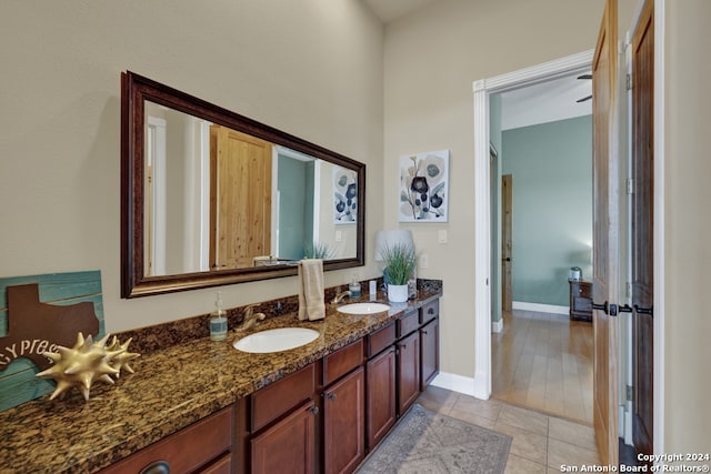 bathroom featuring vanity and hardwood / wood-style flooring