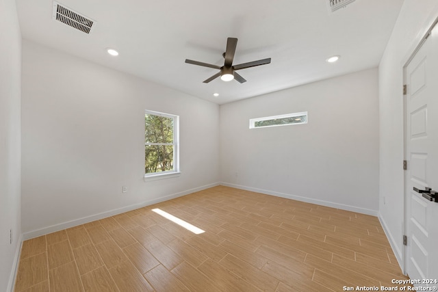 empty room featuring ceiling fan