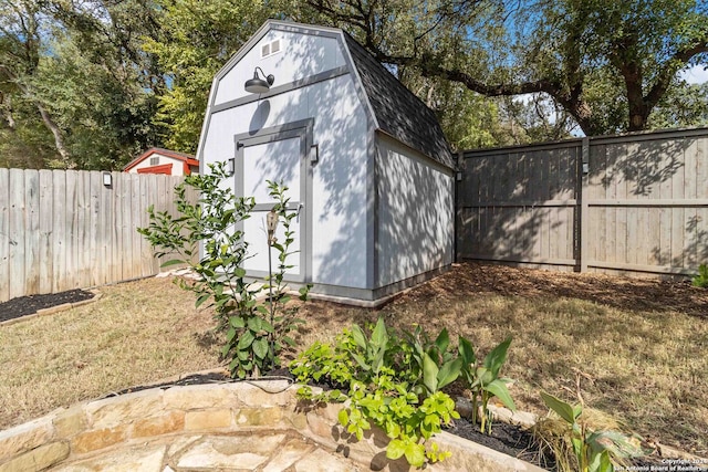 view of outdoor structure with a yard