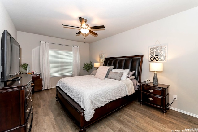 bedroom featuring wood-type flooring and ceiling fan