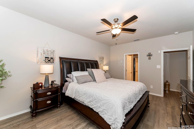 bedroom featuring wood-type flooring and ceiling fan