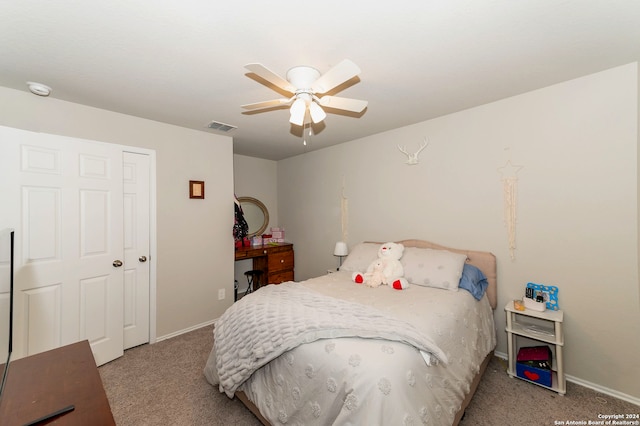 carpeted bedroom with ceiling fan