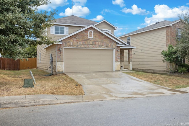 9002 Oakwood Park, San Antonio, TX 78254 - traditional home featuring a garage, concrete driveway, and brick siding