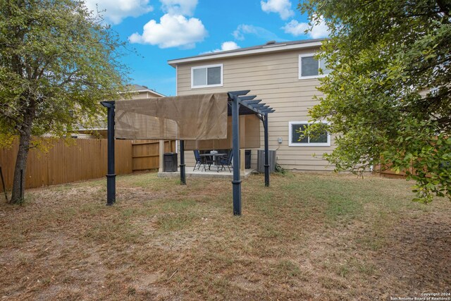 9002 Oakwood Park, San Antonio, TX 78254 - back of property with a pergola and a patio