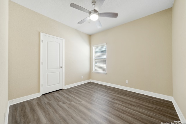 unfurnished room featuring ceiling fan and wood-type flooring