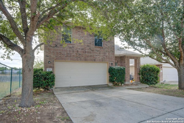 view of front of home with a garage