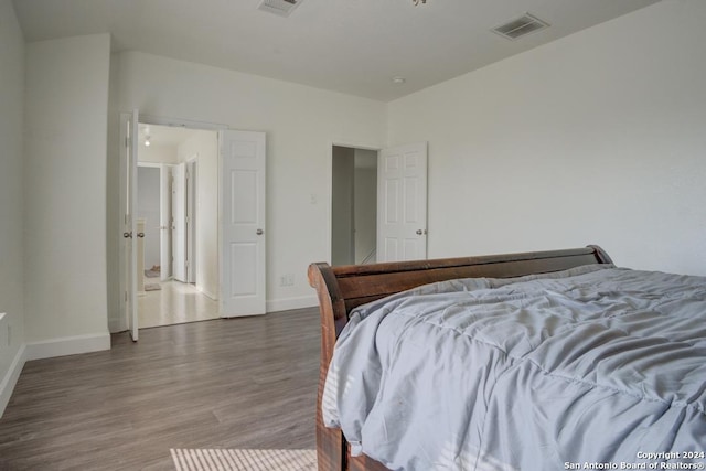 bedroom featuring hardwood / wood-style floors