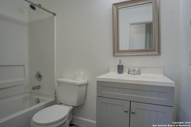 full bathroom featuring vanity, bathtub / shower combination, and toilet