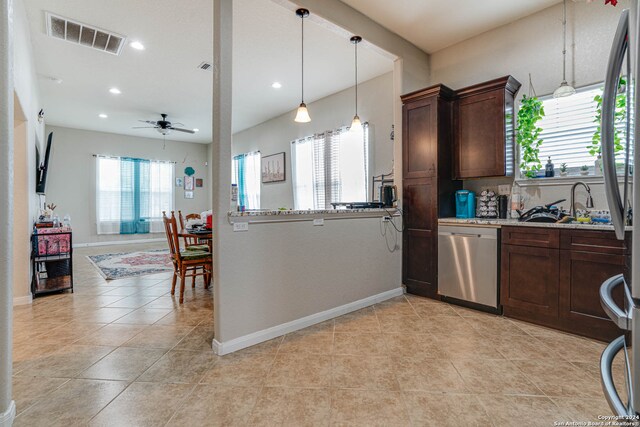 kitchen with dishwasher, backsplash, light tile patterned floors, and ceiling fan