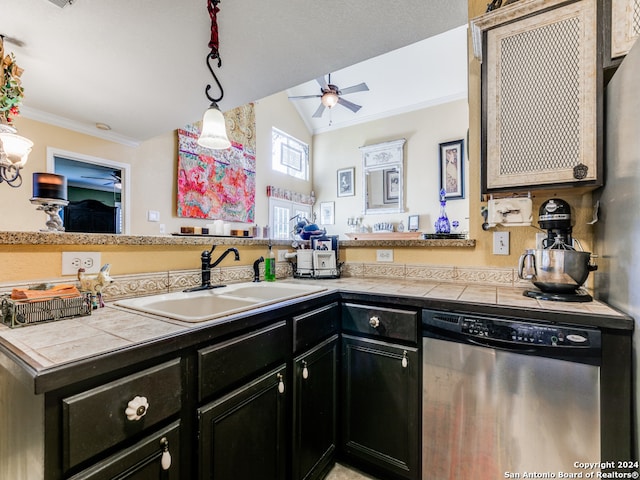 kitchen with tile countertops, pendant lighting, sink, dishwasher, and ceiling fan