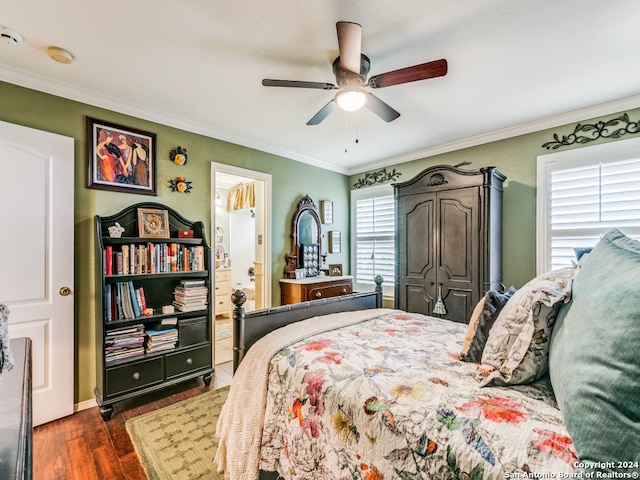 bedroom featuring ornamental molding, multiple windows, ceiling fan, and dark hardwood / wood-style floors