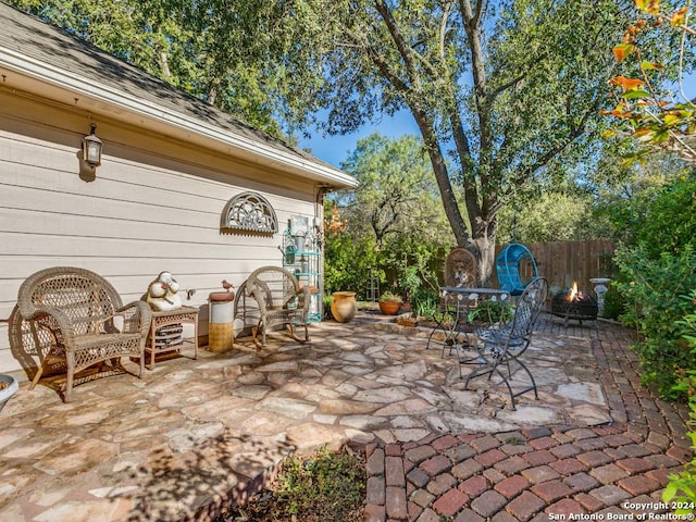 16 Pembroke Ln, San Antonio, TX 78240 - view of patio / terrace with a fire pit and fence