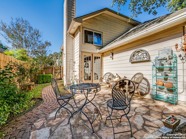 view of patio featuring french doors