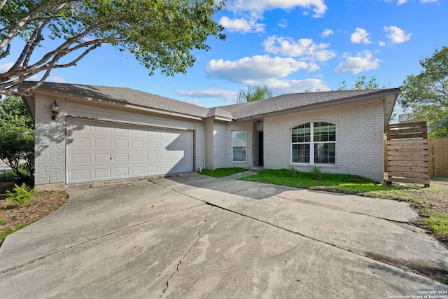 single story home with a garage