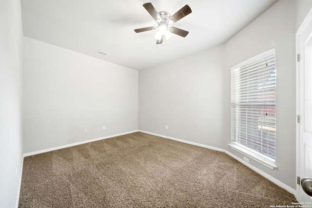 unfurnished room with carpet floors and ceiling fan