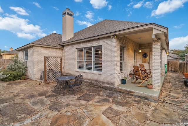 back of house with a patio area