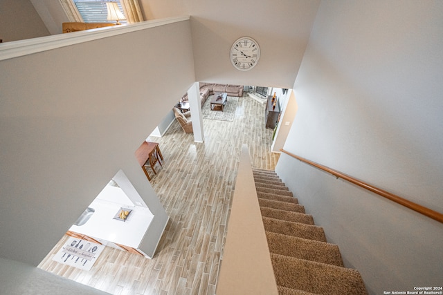 stairway with wood-type flooring