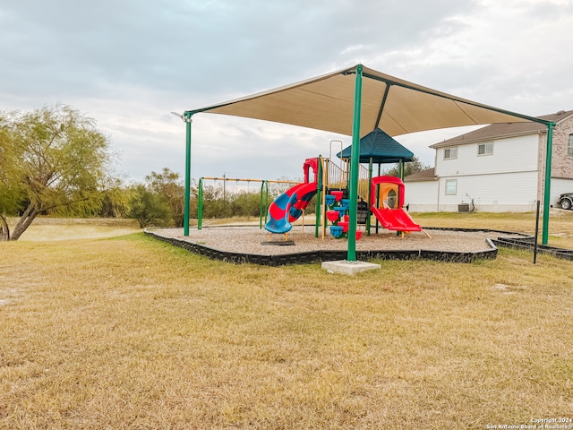 view of jungle gym with a yard