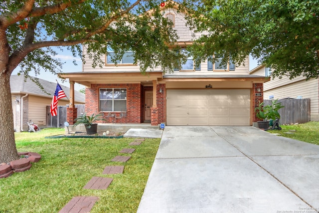 view of front of house with a front yard and a garage