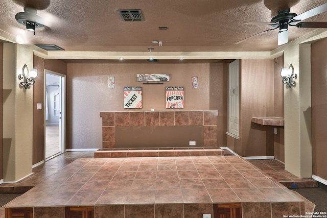 reception area featuring ceiling fan