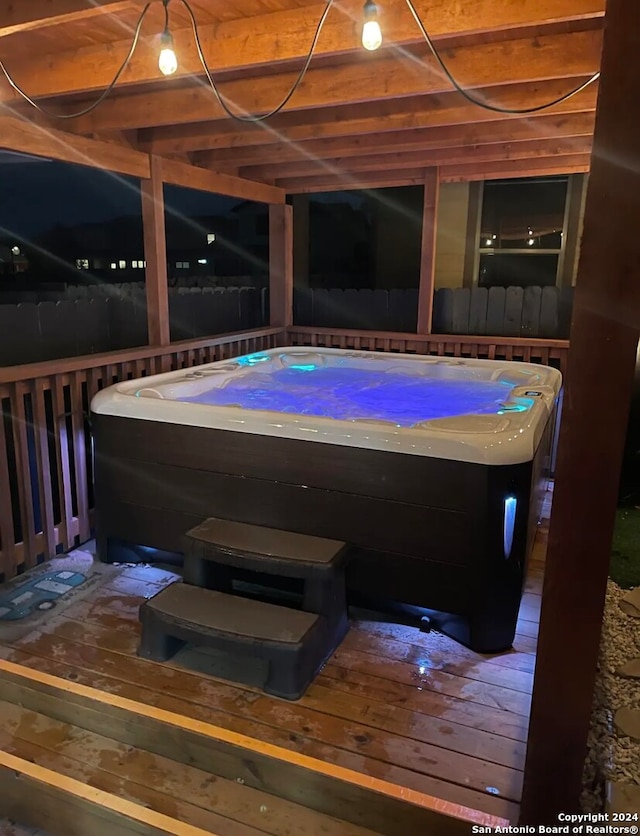 exterior space featuring a hot tub