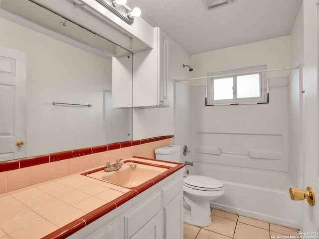 full bathroom with tile patterned flooring, a textured ceiling, backsplash, shower / bath combination, and toilet