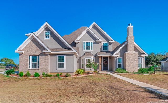 view of front of house featuring a front lawn