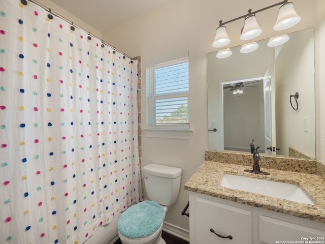 full bathroom featuring shower / bath combo, ceiling fan, vanity, and toilet