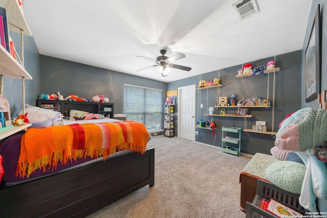 bedroom featuring ceiling fan and carpet floors