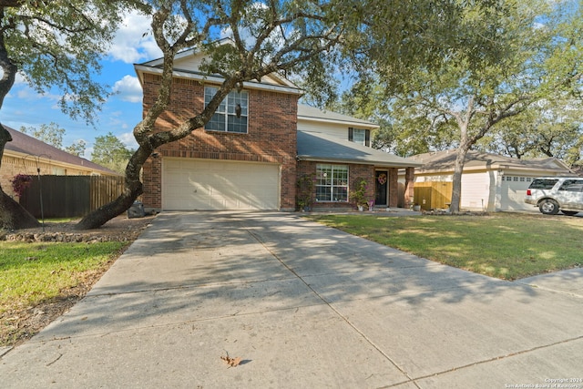 view of property featuring a front yard