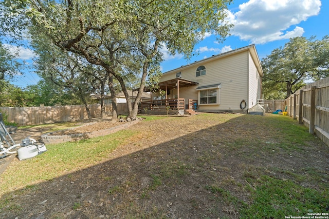 back of property with a patio