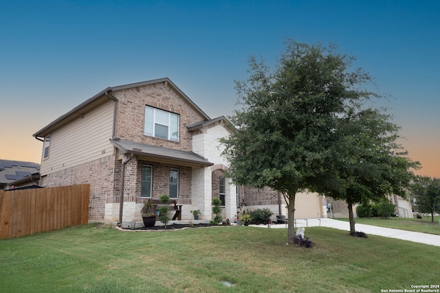 view of front facade with a lawn