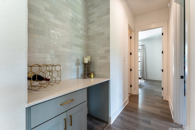 corridor featuring dark hardwood / wood-style flooring