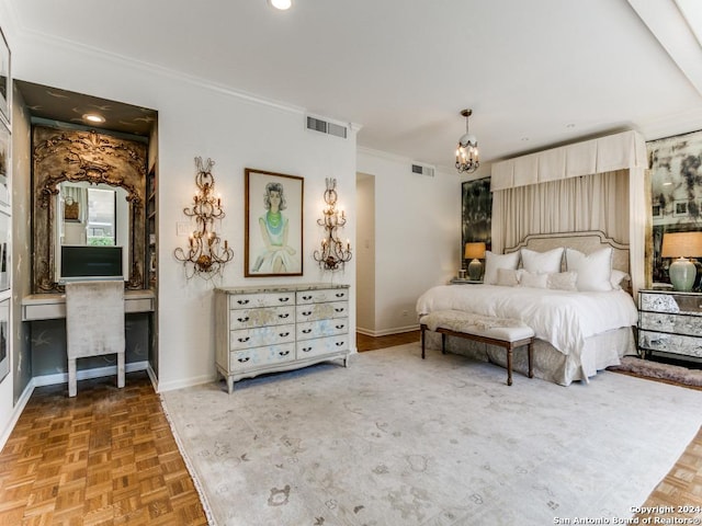 bedroom featuring built in desk, parquet flooring, crown molding, and a notable chandelier