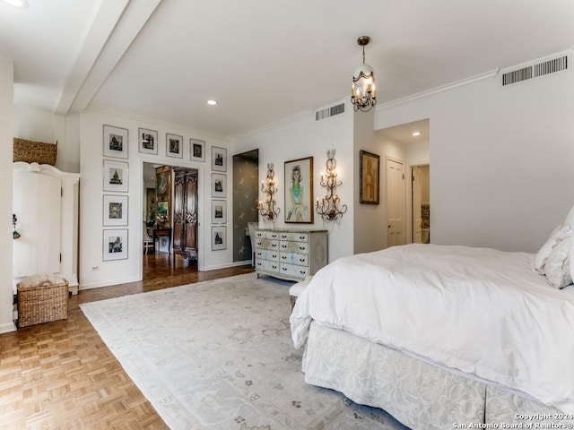 bedroom with a notable chandelier and light parquet flooring